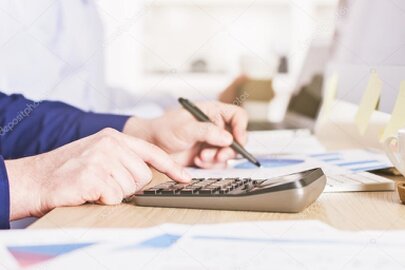 Document with pricing and calculator